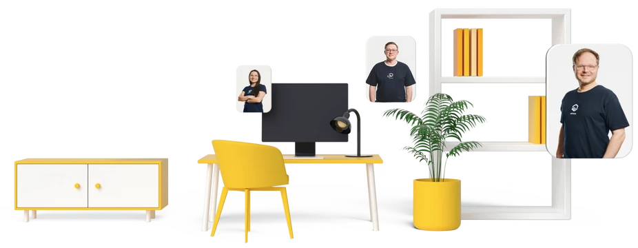 Mehrere Personen in dunkelblauem T-Shirt stehen um einen gelb-weißen Schreibtisch mit gelbem Stuhl, Regalen und Pflanze.